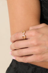A Winning Detail Gold Crystal Horsebit Ring