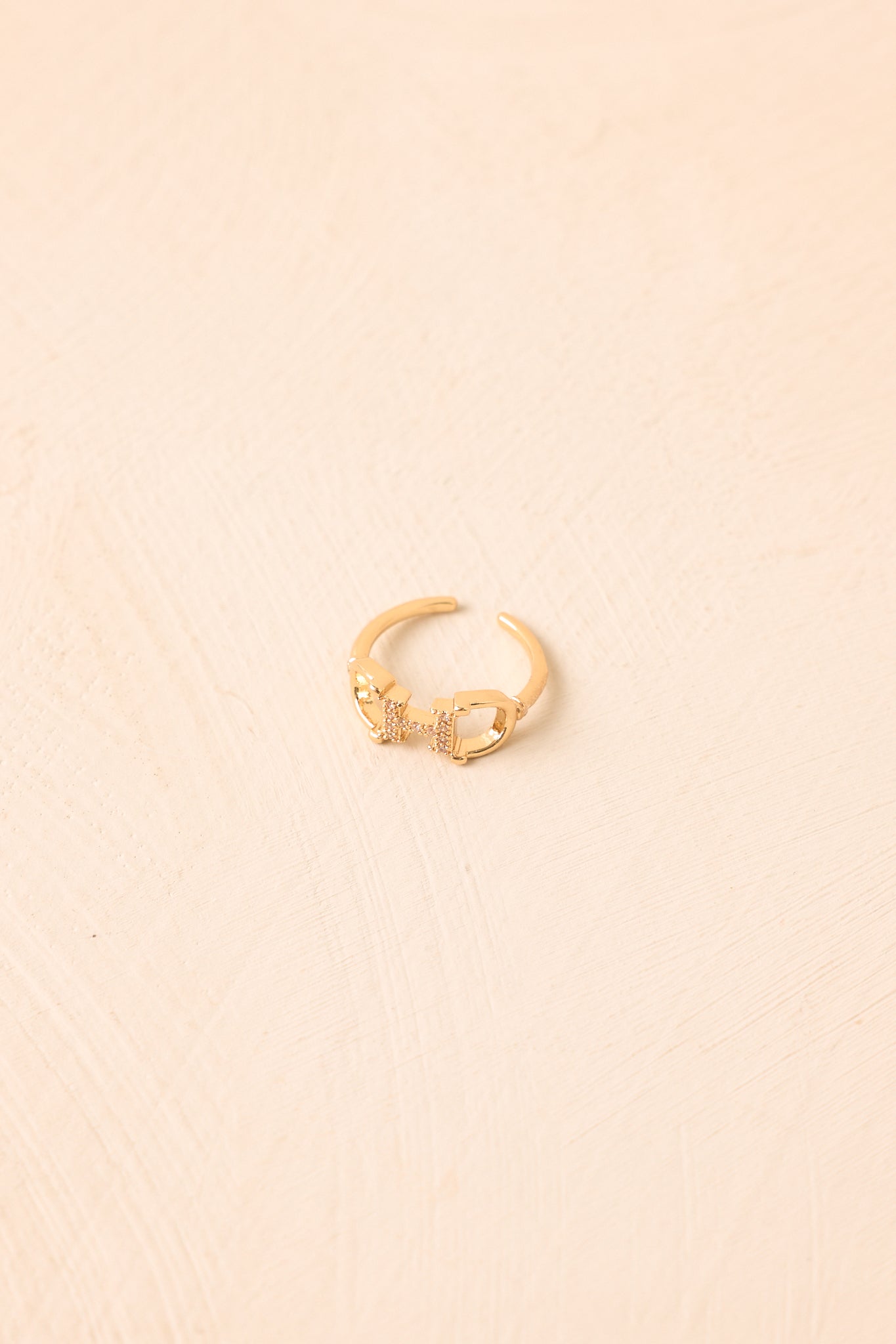 A Winning Detail Gold Crystal Horsebit Ring